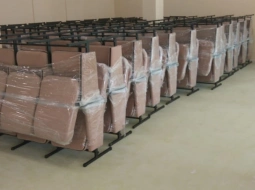 Разгрузили партию кресел для школьного театра